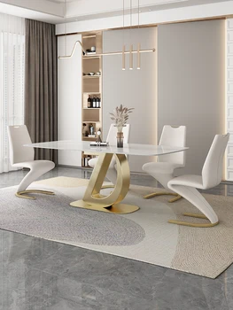 Комбинация сланцевого кухонного стола и стула Небольшая квартира Современный минималистичный Светлый Роскошный Обеденный стол высокого класса Из нержавеющей стали